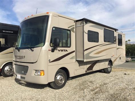 auto levelers, rear camera, slideout, gen, ac,power awning, hitch and more. . Winnebago vista 26he for sale